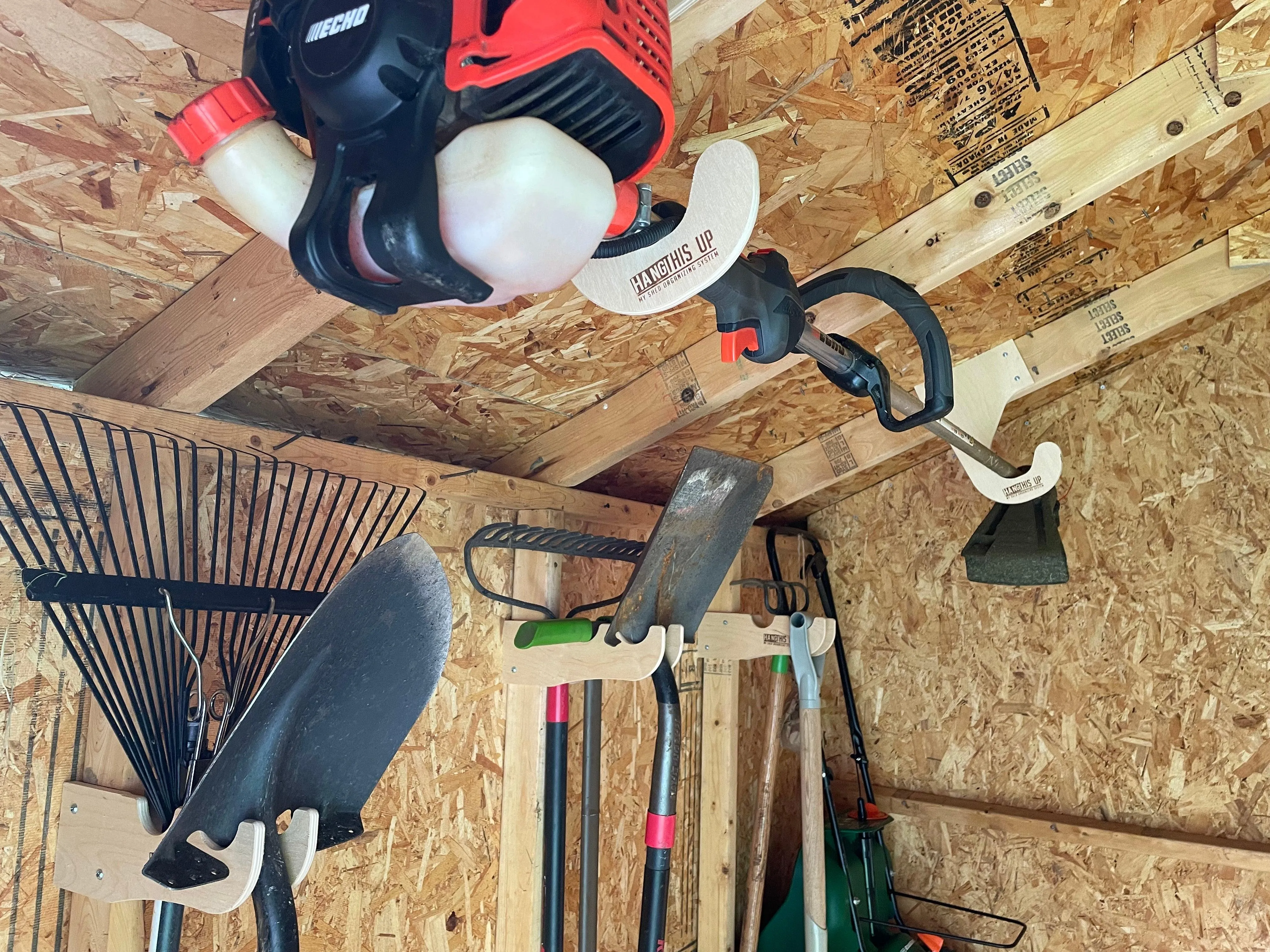 Ceiling Weed Wacker Organizer, hangs from ceiling rafters in shed, easy to install, fits all weed wackers