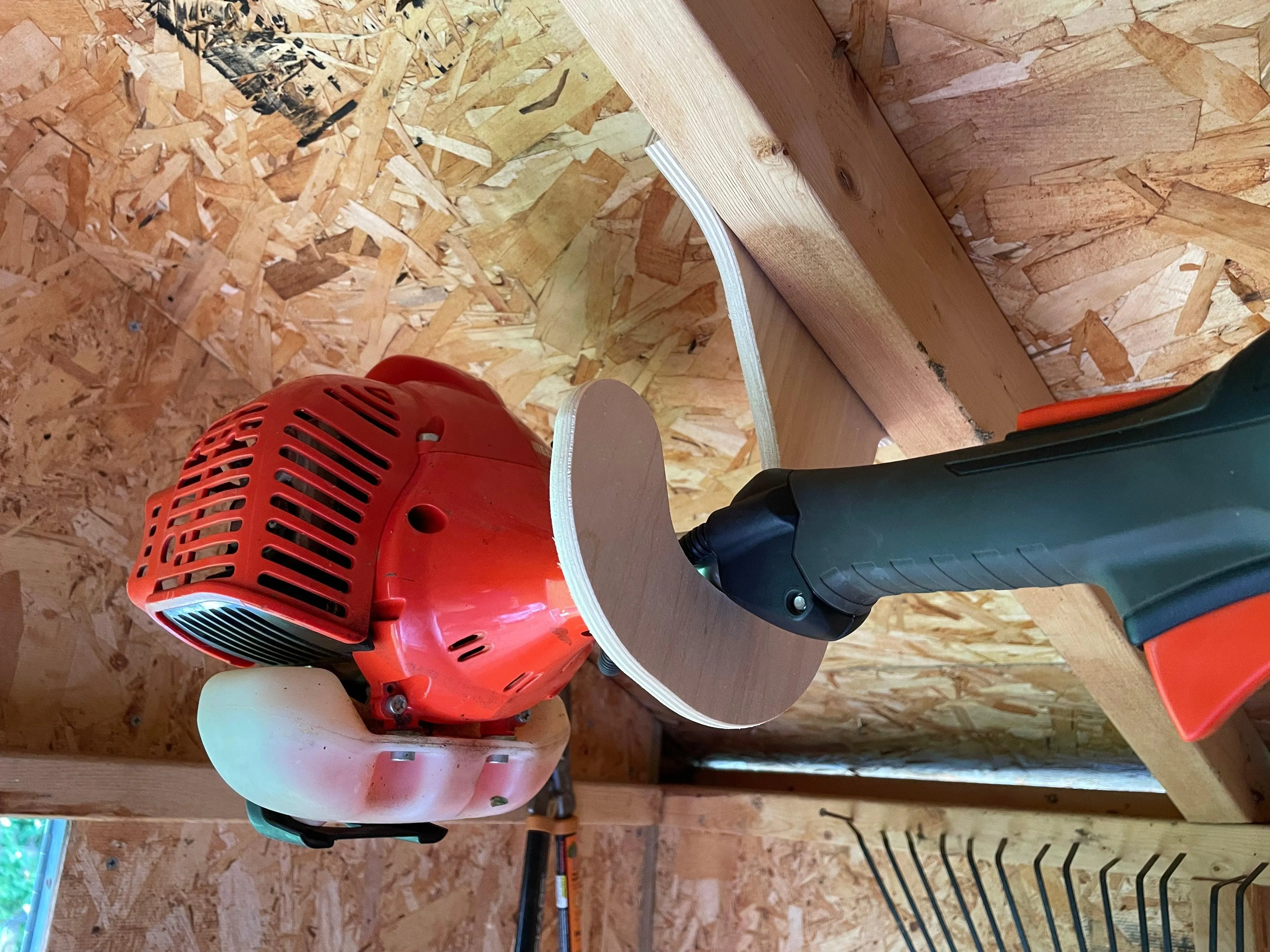 Ceiling Weed Wacker Organizer, hangs from ceiling rafters in shed, easy to install, fits all weed wackers