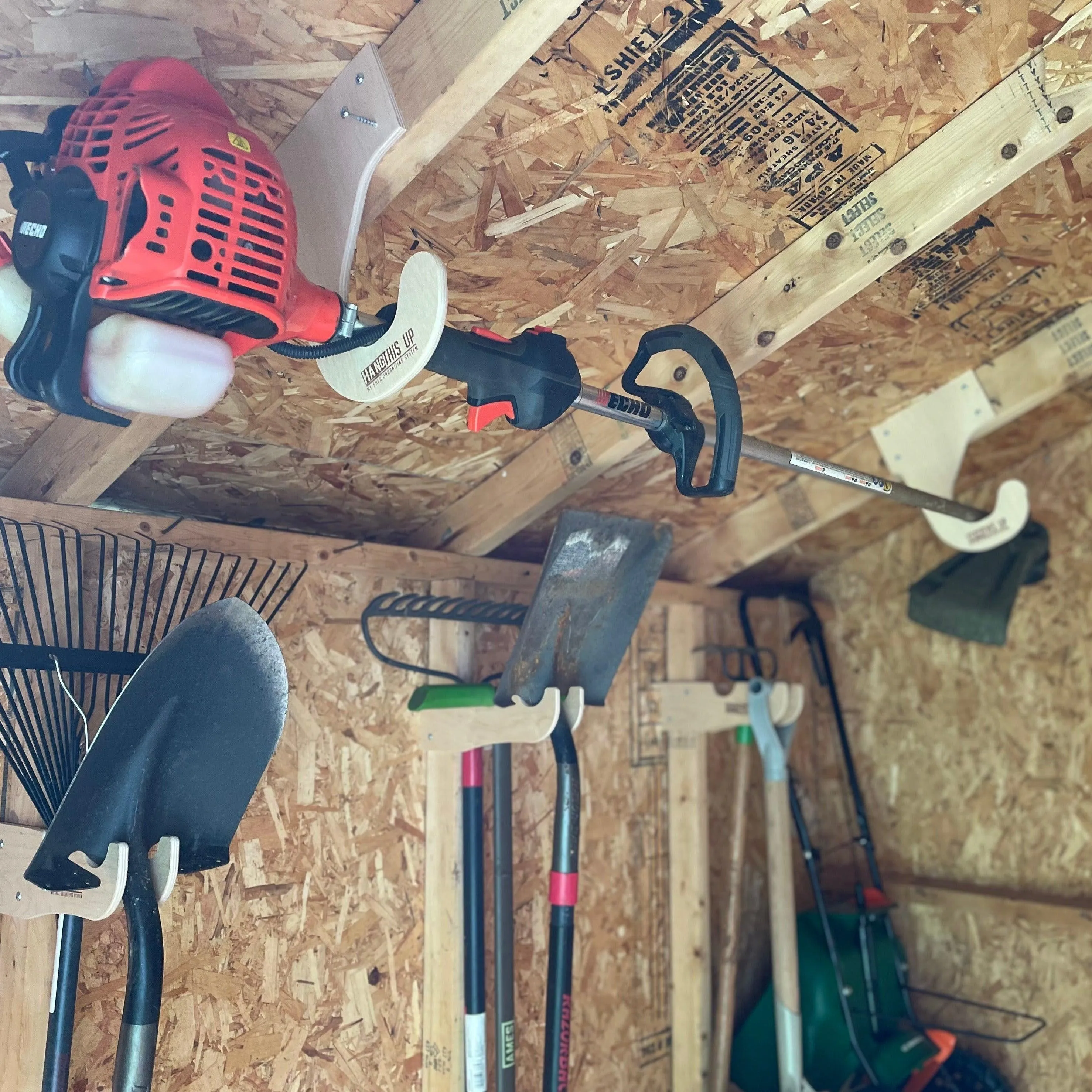 Ceiling Weed Wacker Organizer, hangs from ceiling rafters in shed, easy to install, fits all weed wackers