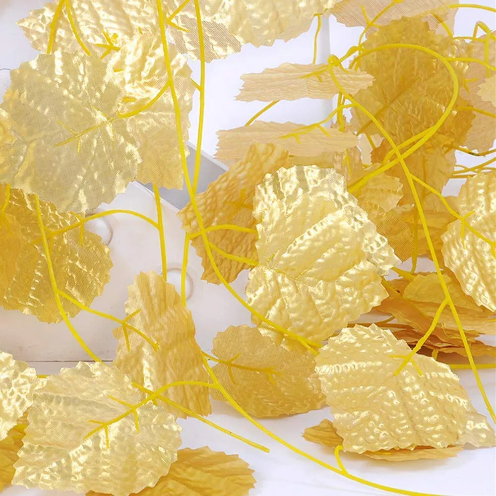 LOGRO Pack of 12 Pcs Artificial Golden Grape Leaves Ivy Vine Garland Hanging for Home Office Wall Decoration. Plastic Plants Best for Wedding, New Year Party(Approx - 7 Ft. Each)